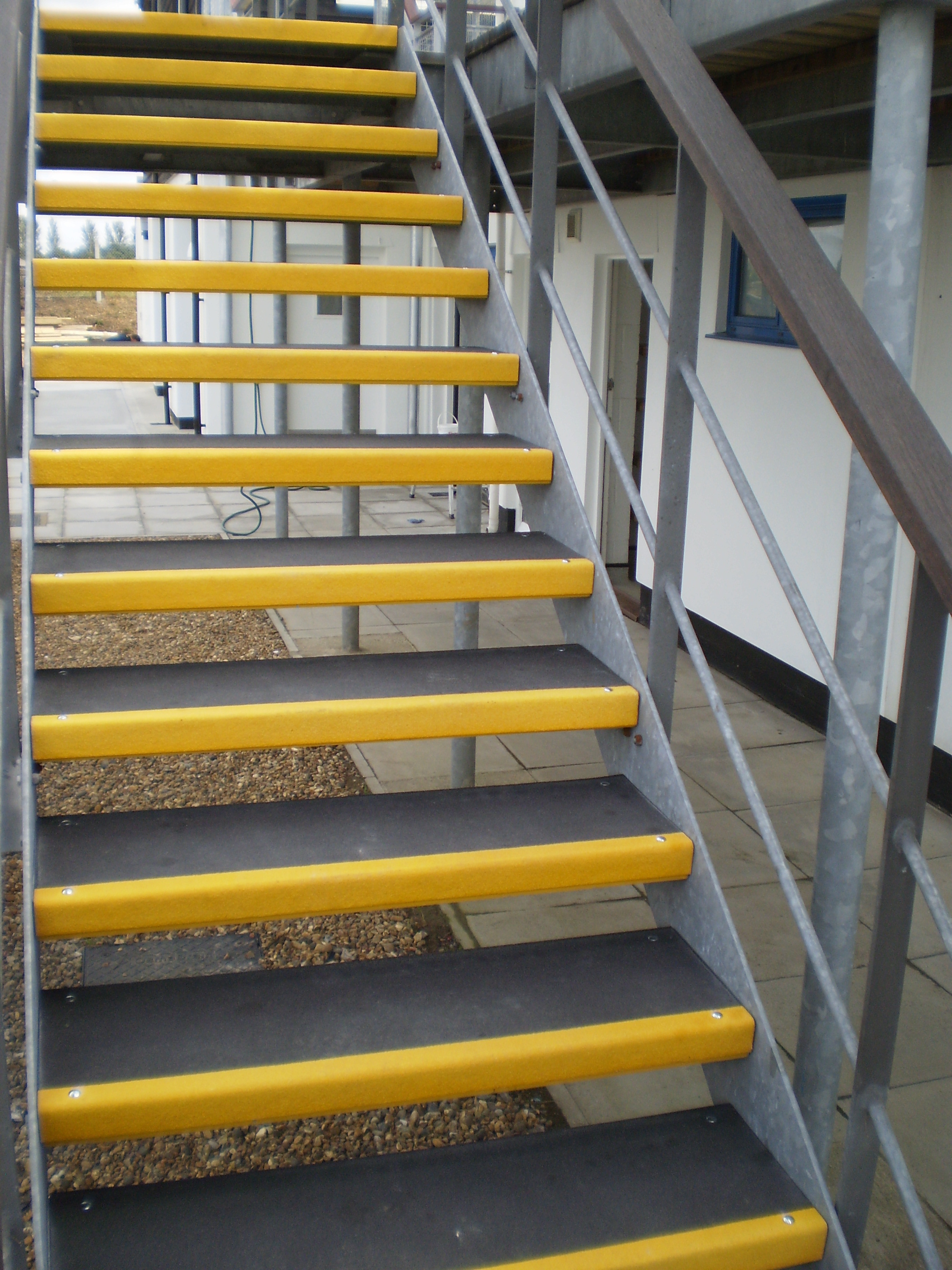 QuartzGrip™ antislip stair tread covers Step on Safety