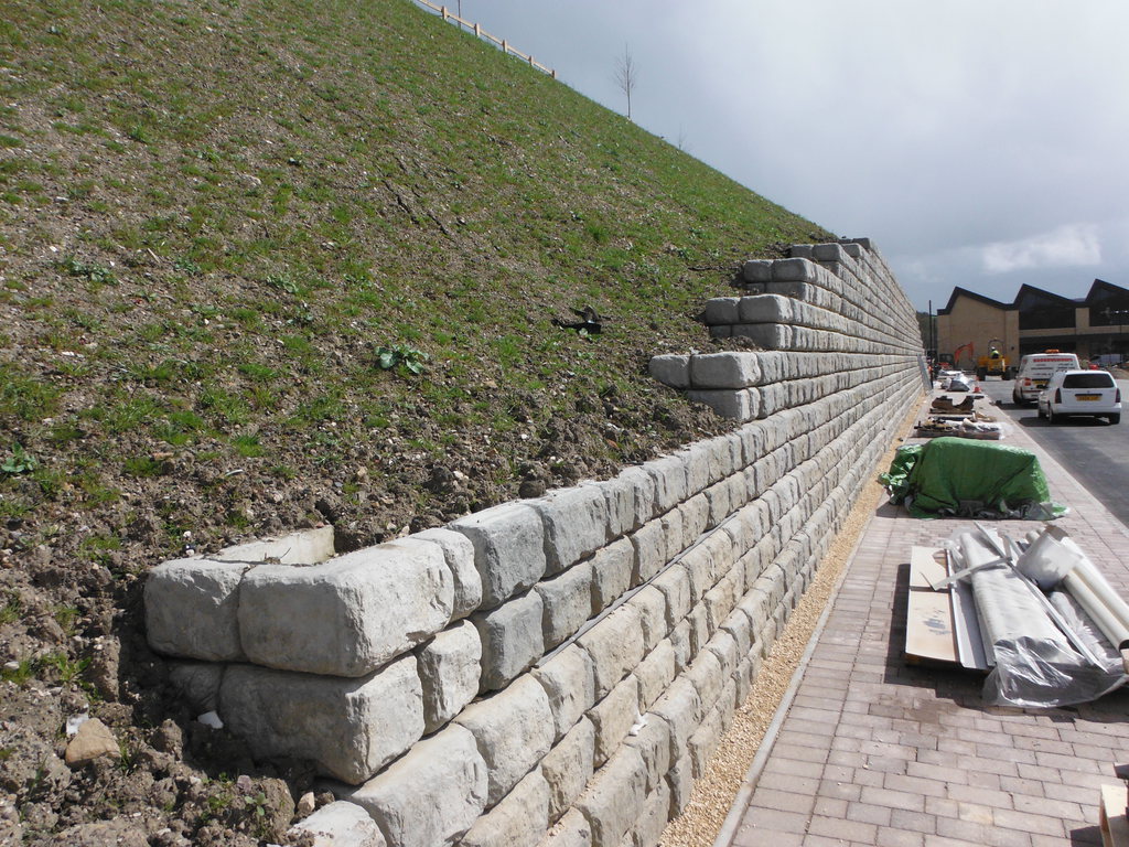 Modular retaining wall system allows more parking space Marshalls CPM