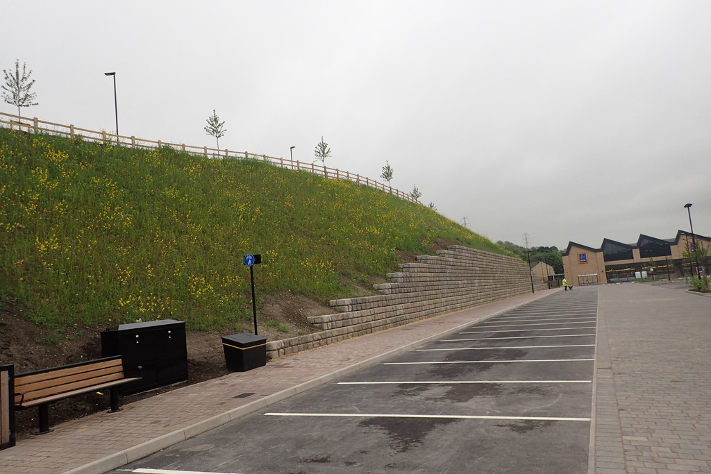 Modular retaining wall system allows more parking space Marshalls CPM