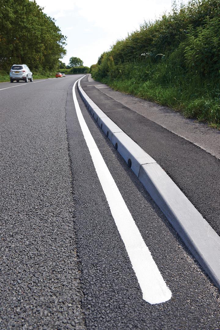 Combined kerb and drainage improves busy A road | Marshalls | ESI ...