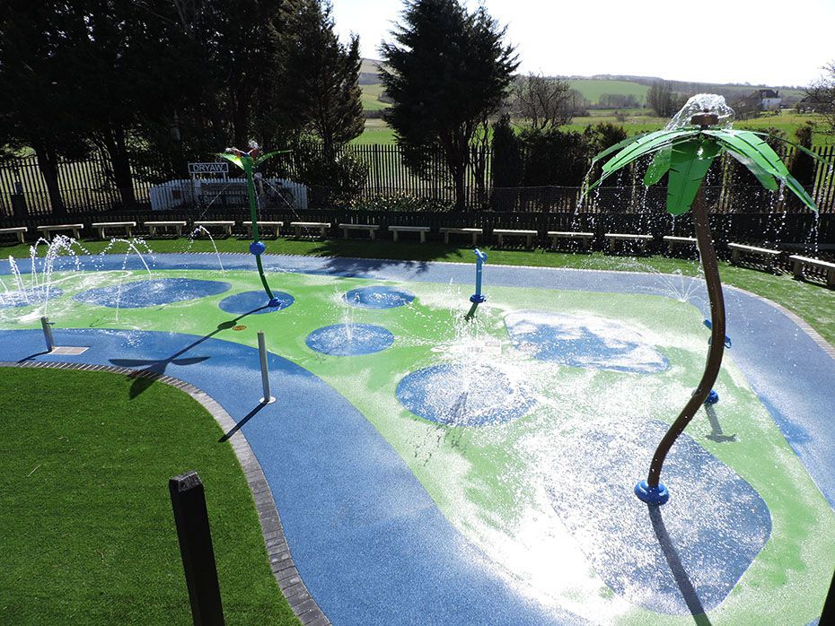 Wet pour surfacing for splash pad installation at zoo RTC Safety
