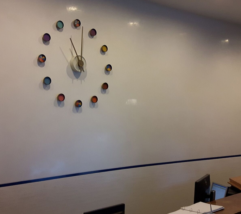 Bespoke interior clock for apartment reception area Good Directions