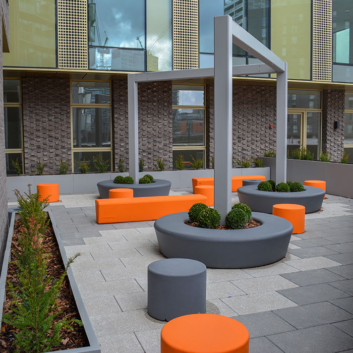 Colourful seating and planters apartment roof terrace Artform Urban