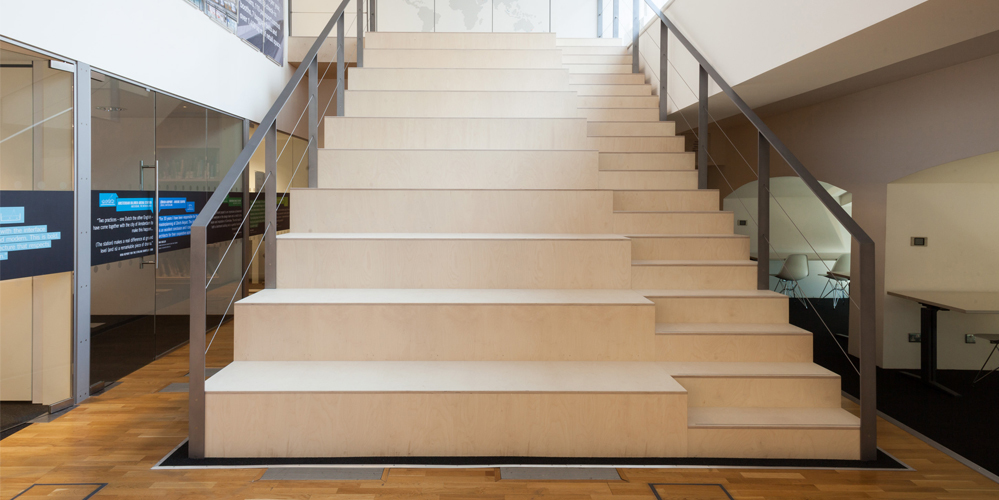 Office bleacher style seating Benchmark ESI Interior Design