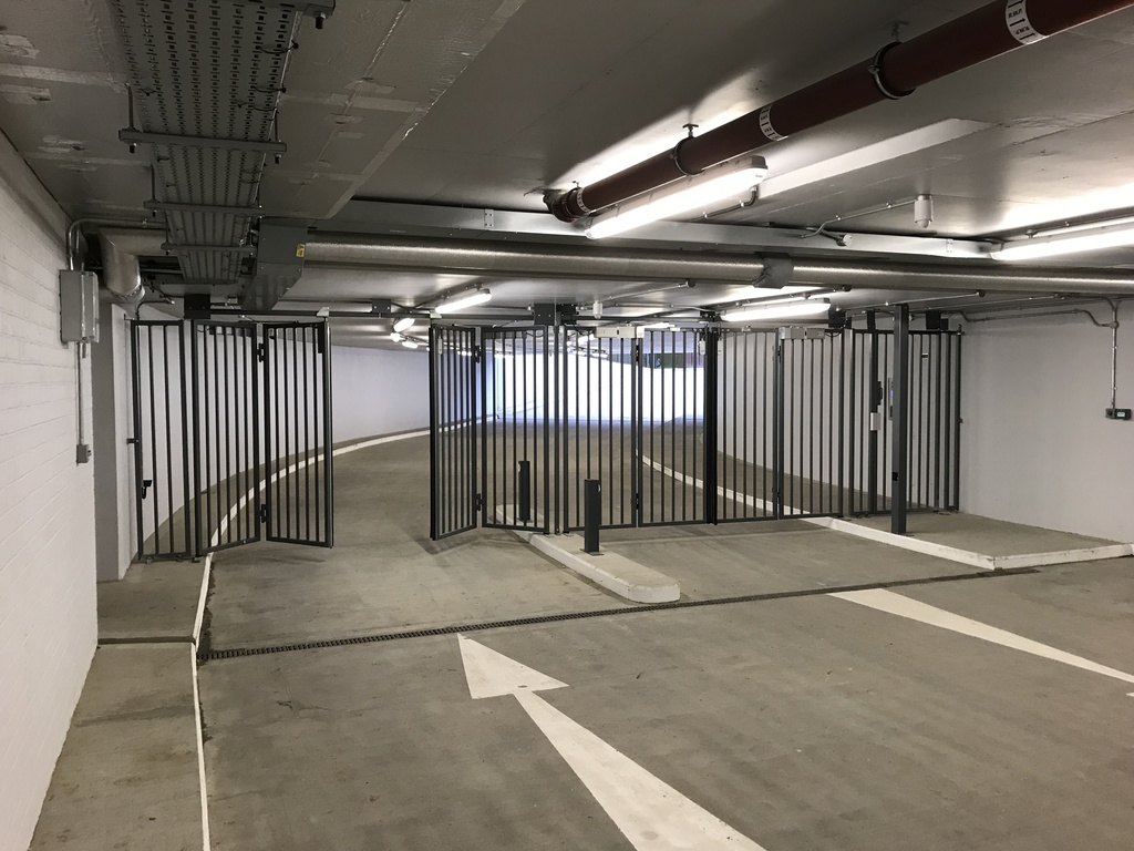 Bifolding gates secure car park for Chelsea apartments Bolton Gate