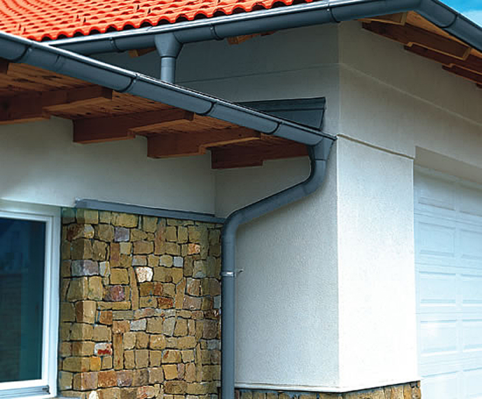 Zinc roof drainage system with gutters and downpipes RHEINZINK ESI