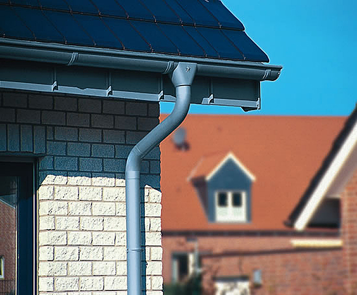 Zinc roof drainage system with gutters and downpipes RHEINZINK ESI