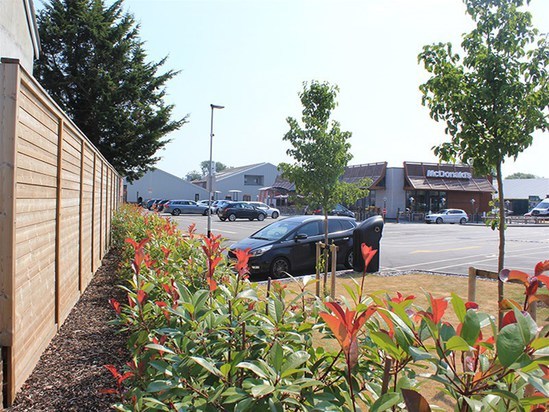 Acoustic fencing noise barrier for fast food restaurant | Jacksons ...