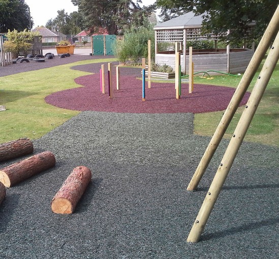 Resin bound rubber mulch safety surfacing for play areas RTC Safety