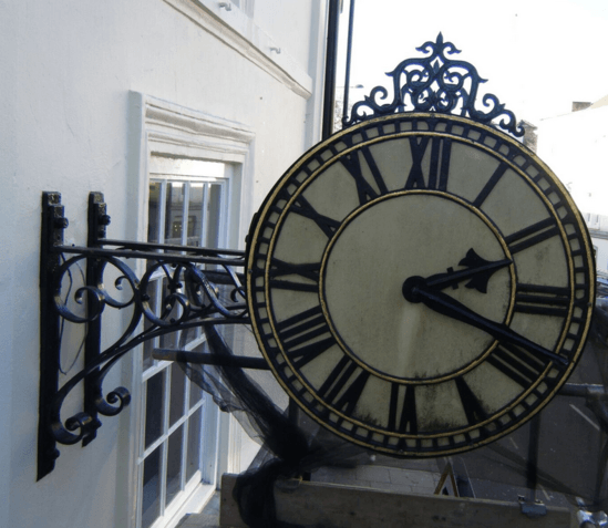Replica ornate drum clock for company building exterior