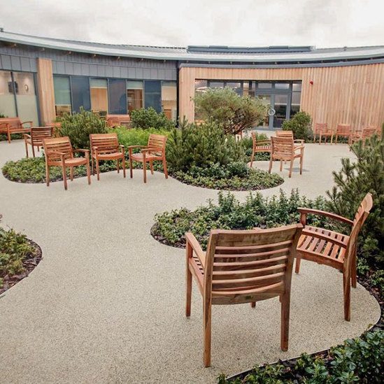 Outdoor timber furniture for cancer treatment centre Artform Urban