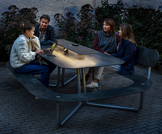 Platea SunHub picnic table and seats by out-sider