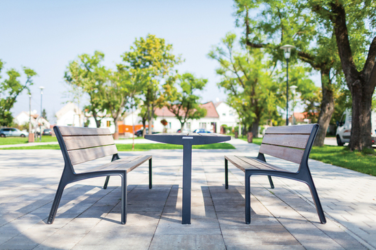 Vera Solo park table shown with benches