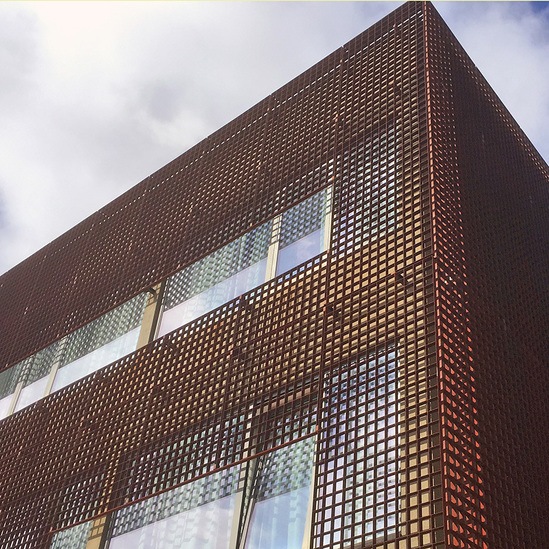 Piazza-132 corten steel grating used as modern cladding | Lang+Fulton ...