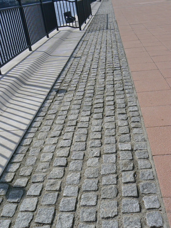 Medium grey cropped setts at Excel Hotel‚ London