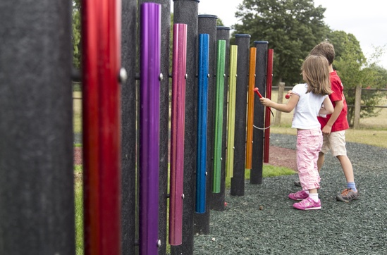 Rainbow music chimes for outdoor play areas