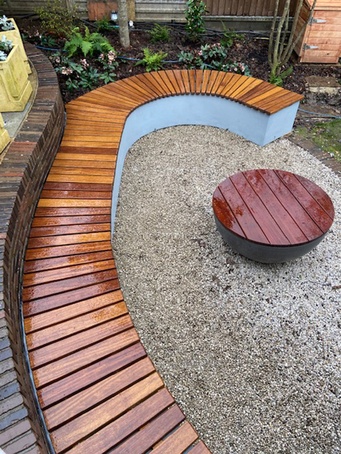 Bespoke curved iroko wall seat | Branson Leisure | ESI External Works