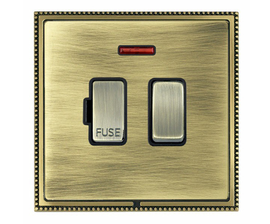 Double pole fused switch in antique brass finish