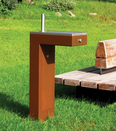 A drinking fountain of simple geometric forms