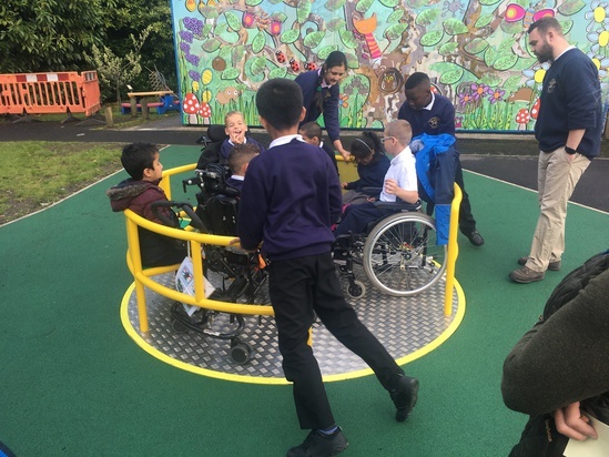 Wheelchair Roundabout with children