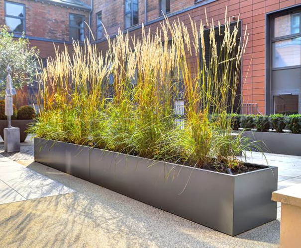 Bespoke steel planters for public realm IOTA ESI External Works