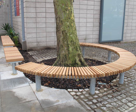 curved bench around tree