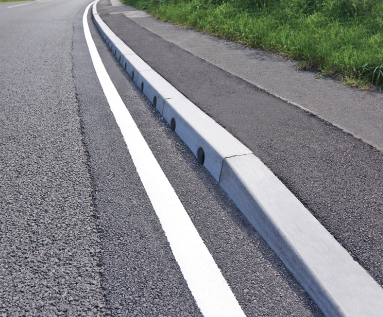 Combined kerb and drainage improves busy A road | Marshalls | ESI ...