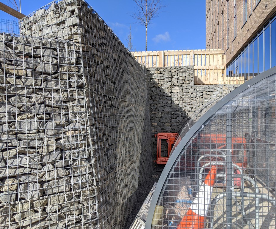 Gabion retaining wall systems for hotel and car park Phi Group ESI
