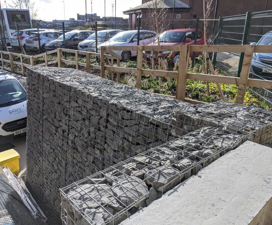 Gabion retaining wall systems for hotel and car park Phi Group ESI