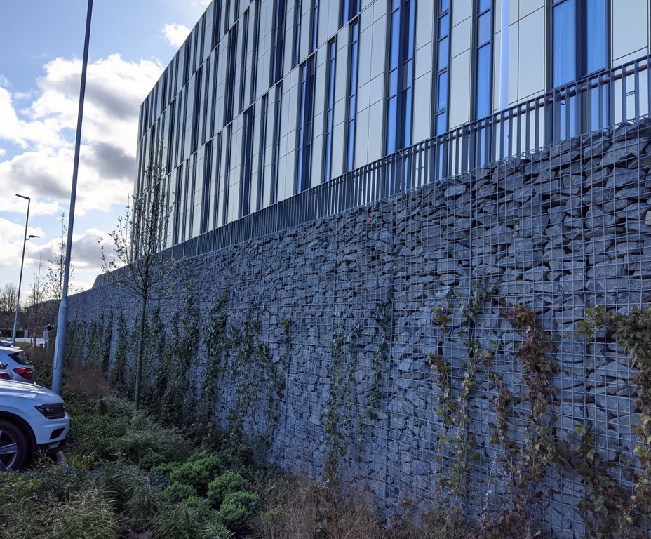 Gabion retaining wall systems for hotel and car park Phi Group ESI
