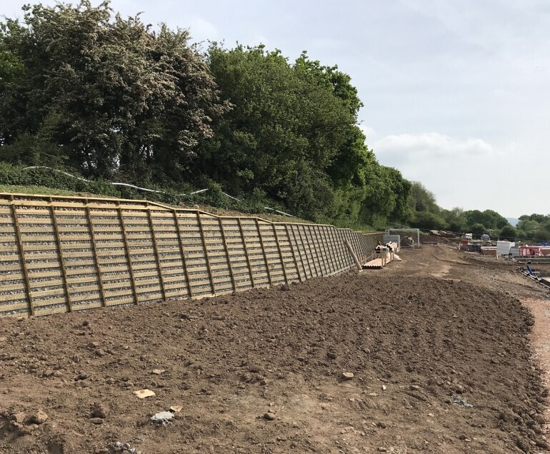 Timber crib retaining wall for new housing development Phi Group