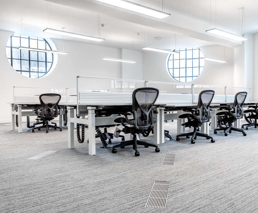 Spacesaving air conditioning system for listed building AET Flexible