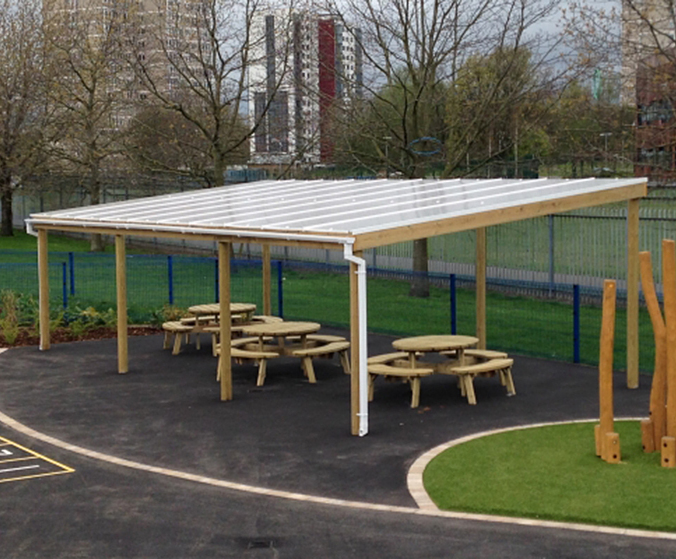 Timberframed canopy with polycarbonate roof Massey & Harris (Eng