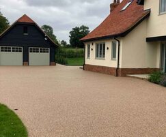 Stonebound porous surfacing for residential driveway