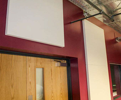 Acoustic panels mounted on fixing plates to the wall