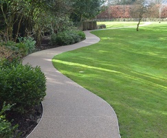 Permeable pathways around garden in London complex