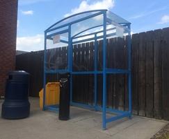 Small blue smoking shelter