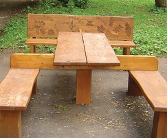 Wheelchair accessible picnic table with text on bakrest