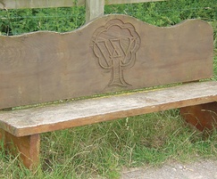 Cedar bench with WI logo sandblasted on backrest