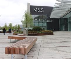 Mmcité Woody timber benches outside Marks & Spencer