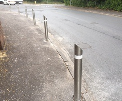 Stainless steel bollards for pavement protection