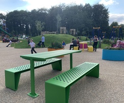 Brightly coloured picnic tables and benches for park