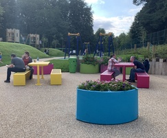 Brightly coloured picnic sets and planters for park