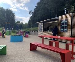 Brightly coloured picnic suites and planters for park
