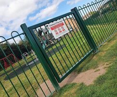 KinderGate self-closing gate for playgrounds