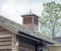 Sarum brown roof turret for village hall
