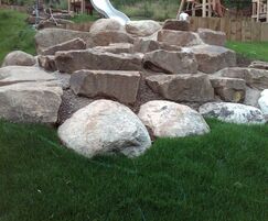 Large gritstone blocks create feature in play area
