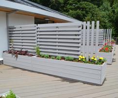 Grenadier planters with trellis panels attached