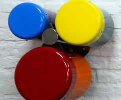 Colourful wall-mounted Drums