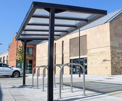 Heron cycle shelter with Sheffield cycle stands